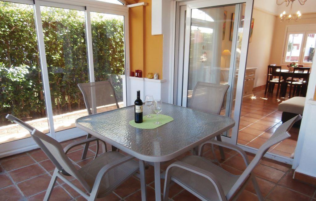 Ona Mar Menor Golf & Spa Torre-Pacheco Chambre photo A patio table and chairs